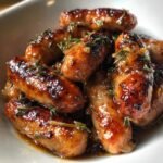 Cider-braised mini sausage bites