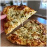 Air fryer garlic butter naan pizzas
